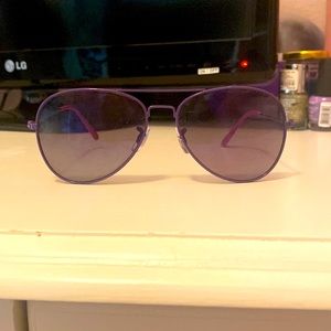 Purple sunglasses. Brand: I don’t know.